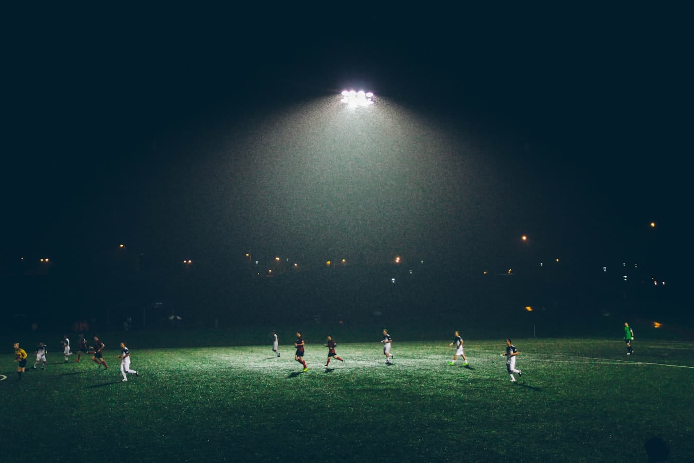 Soccer players demonstrating technical skill and focus